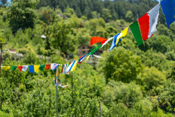 Fototapeta na wymiar Budhist flags in the mountains near hamta