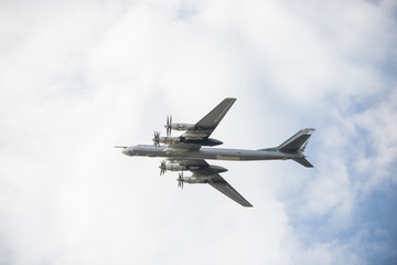 Military long range bomber aircraft flying in the sky