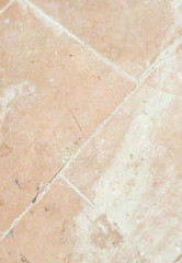 Old concrete background with tiles. Wall or floor texture.