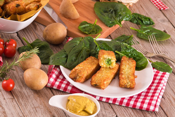 Potato croquettes with spinach and mozzarella. 