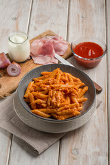 pasta with ham cream and tomato sauce