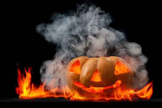 Halloween pumpkin with smoke.