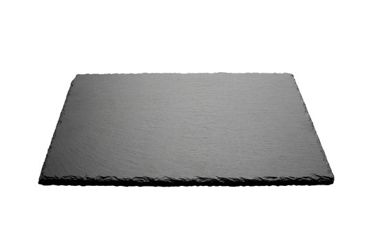 Empty food black square slate plate board isolated on white background. Dark grey slate board for dishes.