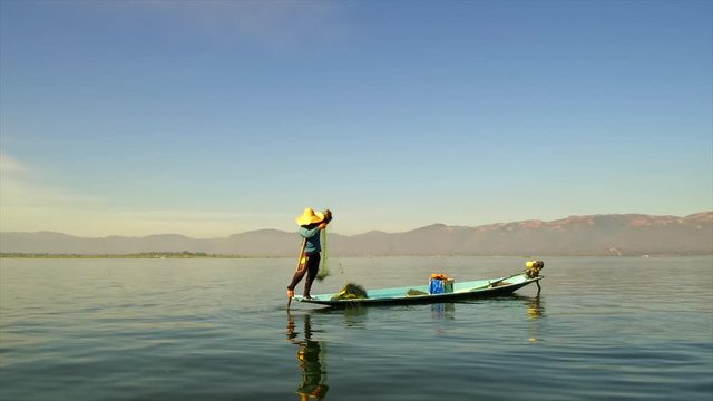 Inle lake Shan State Myanmar.Floating Gardens and Villages. Commerce and Trade primarily by Long Boats. Surreal vision with mountainous backdrops.