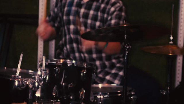 Rock band rehearses edited sequence
