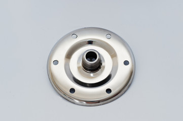 Spare part round disc for water pump isolated on white.