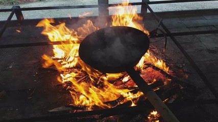 Steaming chestnuts cooked over the fire, Vittorio Veneto, Italy