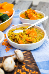 Lentil. Cooked lentil beans with carrot and vegetables. Vegan lunch or vegetarian dinner.