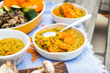 Lentil. Cooked lentil beans with carrot and vegetables. Vegan lunch or vegetarian dinner.