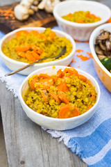 Lentil. Cooked lentil beans with carrot and vegetables. Vegan lunch or vegetarian dinner.