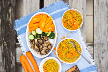 Lentil. Cooked lentil beans with carrot and vegetables. Vegan lunch or vegetarian dinner.