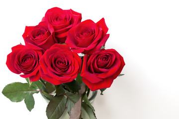 Bouquet of red roses on white background with copy space.