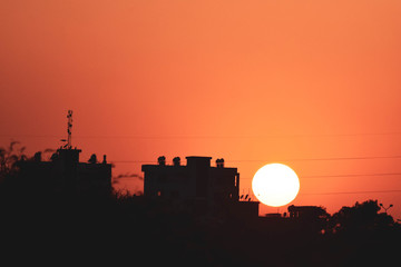 Fototapeta premium Black and orange background, sunset