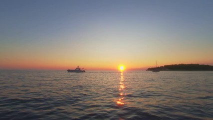 Sunset over the horizon from the sea