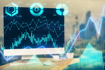 Financial chart drawing and table with computer on background. Double exposure. Concept of international markets.