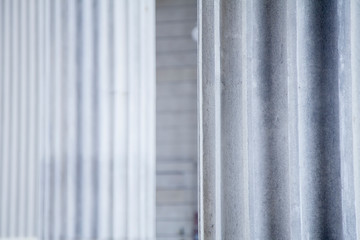 Close up of a line of Gerek style columns background. Selective focus.