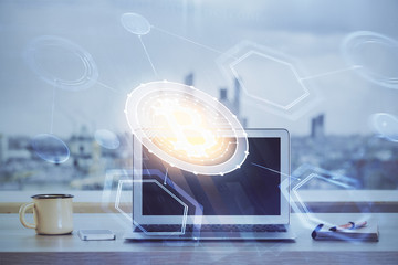Double exposure of blockchain and crypto economy theme hologram and table with computer background....