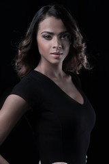 Fototapeta premium Beautiful and attractive model in black dress.