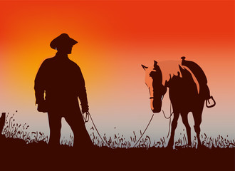 Fototapeta na wymiar Cowboy with his horse