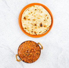 Indian Healthy Cuisine Chana Masala Also Known as Spicy Chickpeas, Channay, Chole Masala or Chholay is a Tasty & Flavourful Curry Made By Cooking Chickpeas in a Spicy Onion Tomato Masala Gravy