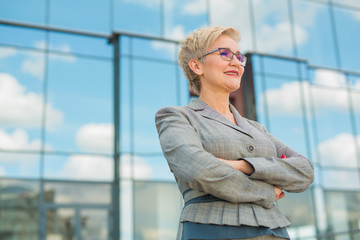 portrait of stylish woman in a suit with a short haircut