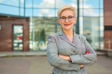 portrait of stylish woman in a suit with a short haircut