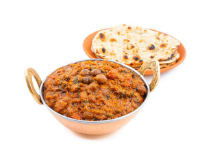 Indian Healthy Cuisine Chana Masala Also Known as Spicy Chickpeas, Channay, Chole Masala or Chholay is a Tasty & Flavourful Curry Made By Cooking Chickpeas in a Spicy Onion Tomato Masala Gravy