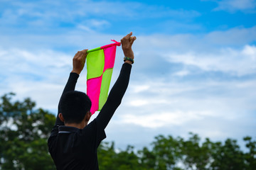 Flag soccer in hand of assistant referee soccer football 