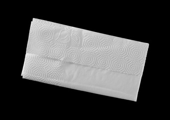 White tissue, handkerchief isolated on black background, top view