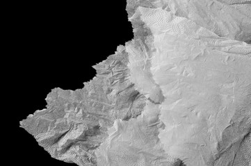 White torn and crumpled tissue, handkerchief scraps isolated on black background, top view