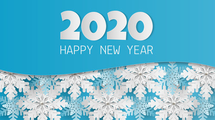 Paper art of 2020 happy new year text with snowflake on blue background