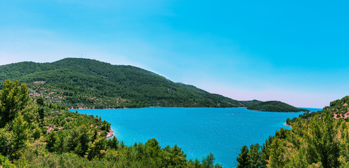 Fototapeta na wymiar Panoramic view of clear blue sea with islands, Adriatic coast, Croatia