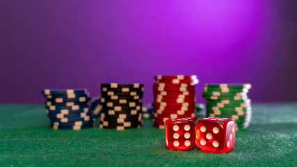 poker chips, dice on table close up
