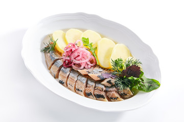 Raw Salted Soused Herring with Onions and Potato Isolated