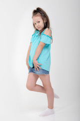 Obraz premium Thoughtful little girl six years old daughter look away on copy space thinking isolated on grey beige background, funny kid pout lips hold finger near mouth conceived some kind of prank, concept image