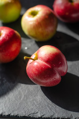 red apples on black background