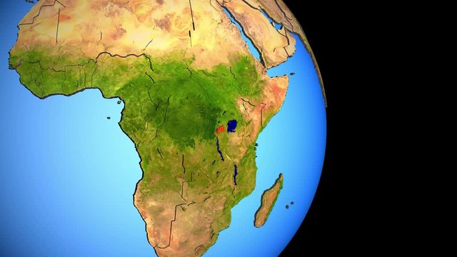 Closing in on Rwanda on political 3D globe with topography. 3D illustration.