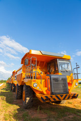 Fototapeta premium pit mine with a large dump truck