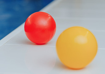 red and yellow plastic balls