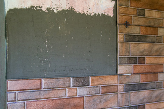 laying ceramic tiles in the kitchen,work on laying tile brick squares