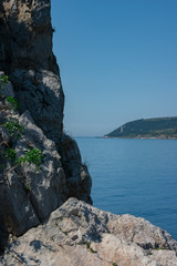 View from a cliff in the sea to the island. Crimea. Black Sea.