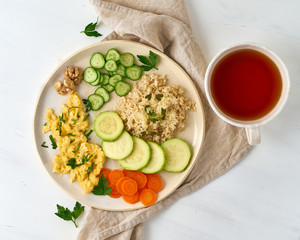 Balanced gluten free food, brown rice & zucchini with scramble, dash fodmap diet