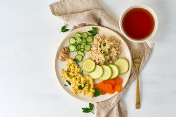 Balanced gluten free food, brown rice & zucchini with scramble, dash fodmap diet