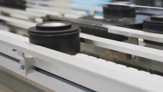 Belt conveyor system carrying compact products 4K UH clog footage