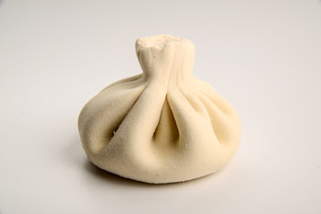 Georgian dumplings Khinkali with meat, frozen product