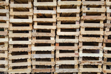 A pile of empty wooden fruit crates
