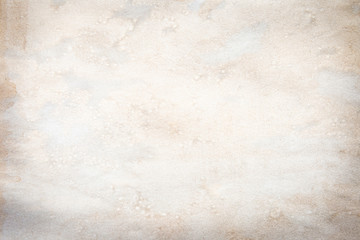 Old brown and white paper stained with coffee. Vintage abstract background.