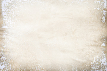 Old brown and white paper stained with coffee. Vintage abstract background.