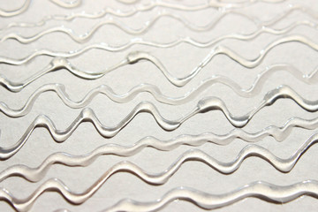 Abstract blurred texture background.  Strange wavy texture. Wavy lines of rubber glue.