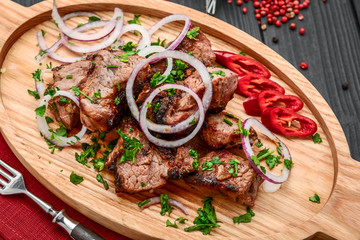 Assorted delicious grilled meat with vegetable on white plate picnic table for family bbq party